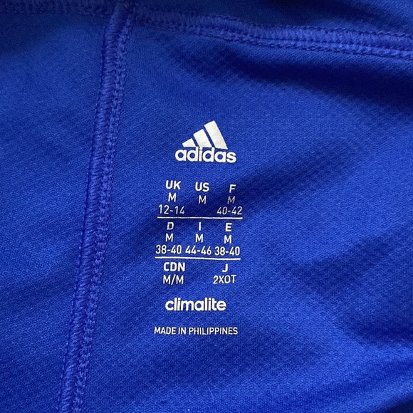 blue with white striped adidas, athletic shorts. - Picture 2 of 3